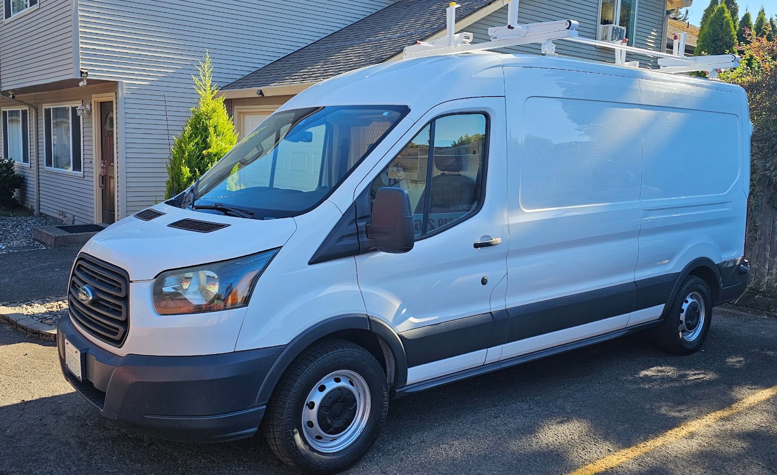 Brightwise Electric work van parked at a customer home in Vancouver, WA