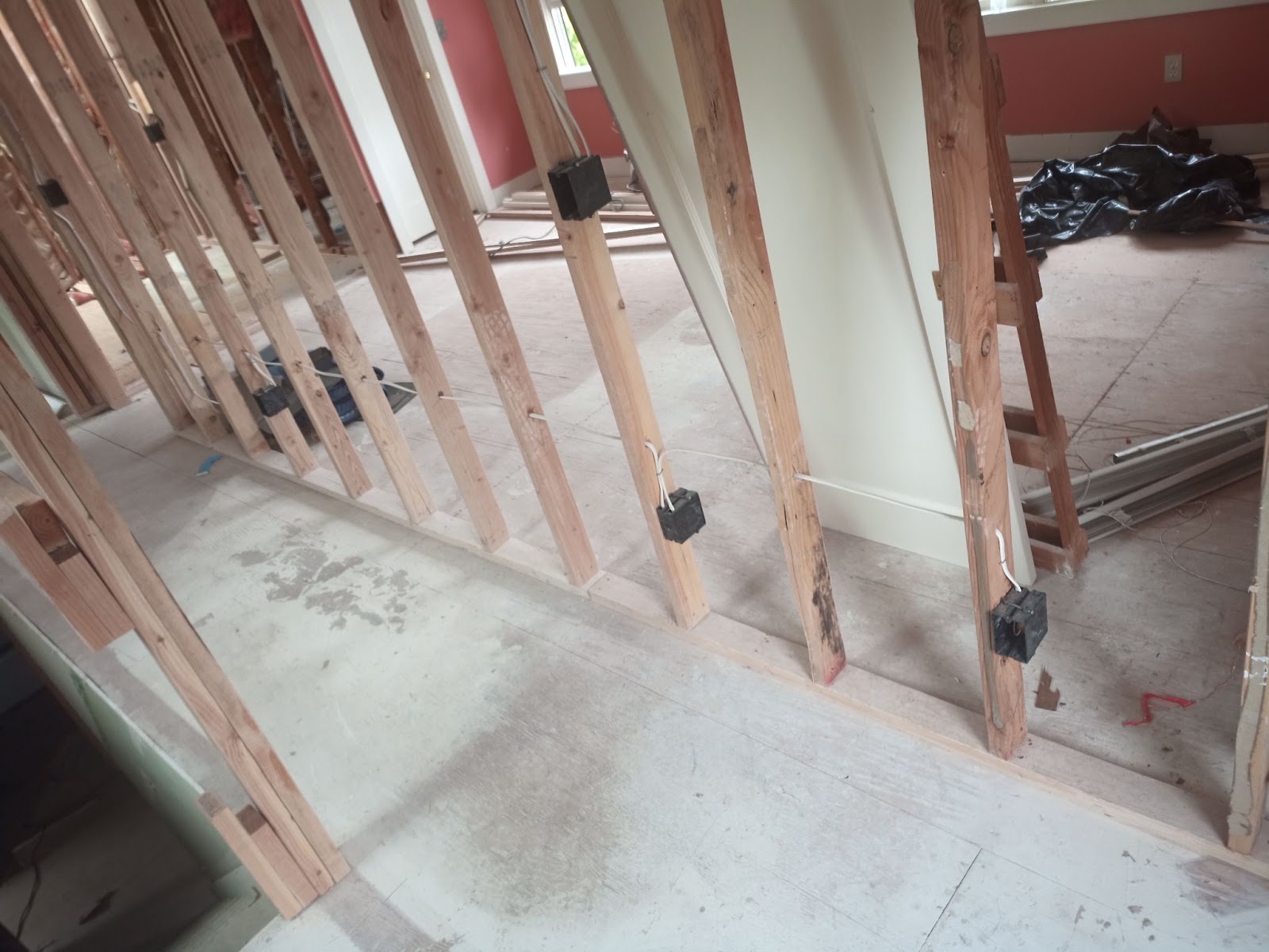Whole-house rewiring in progress with new outlet boxes on open studs during a Vancouver, WA remodel