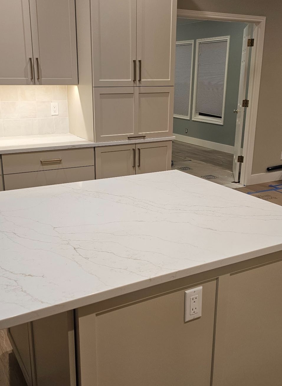 Finished kitchen island receptacle and under-cabinet lighting after a Vancouver, WA remodel