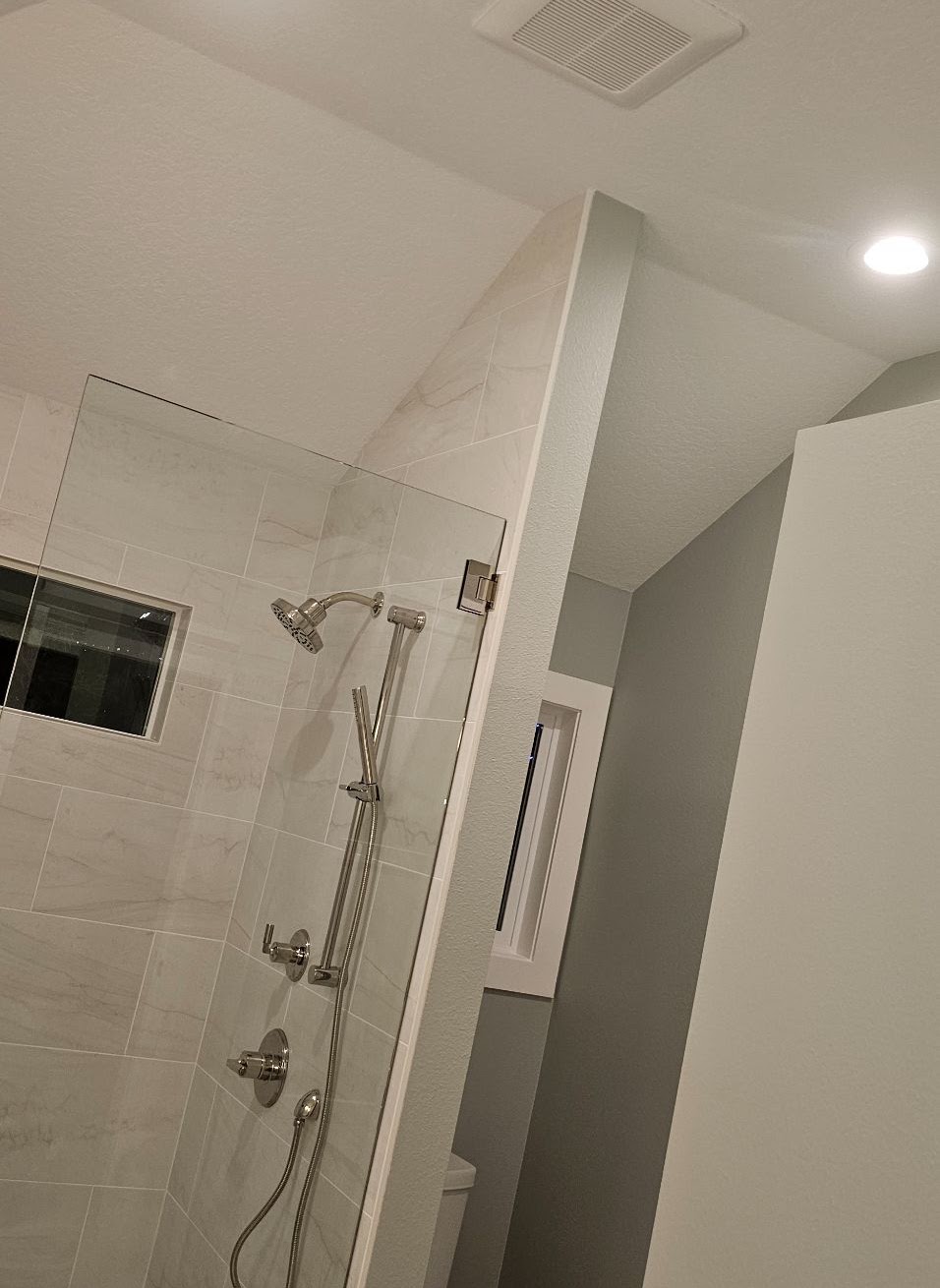Bathroom exhaust fan and recessed shower lighting installed in a Vancouver, WA remodel