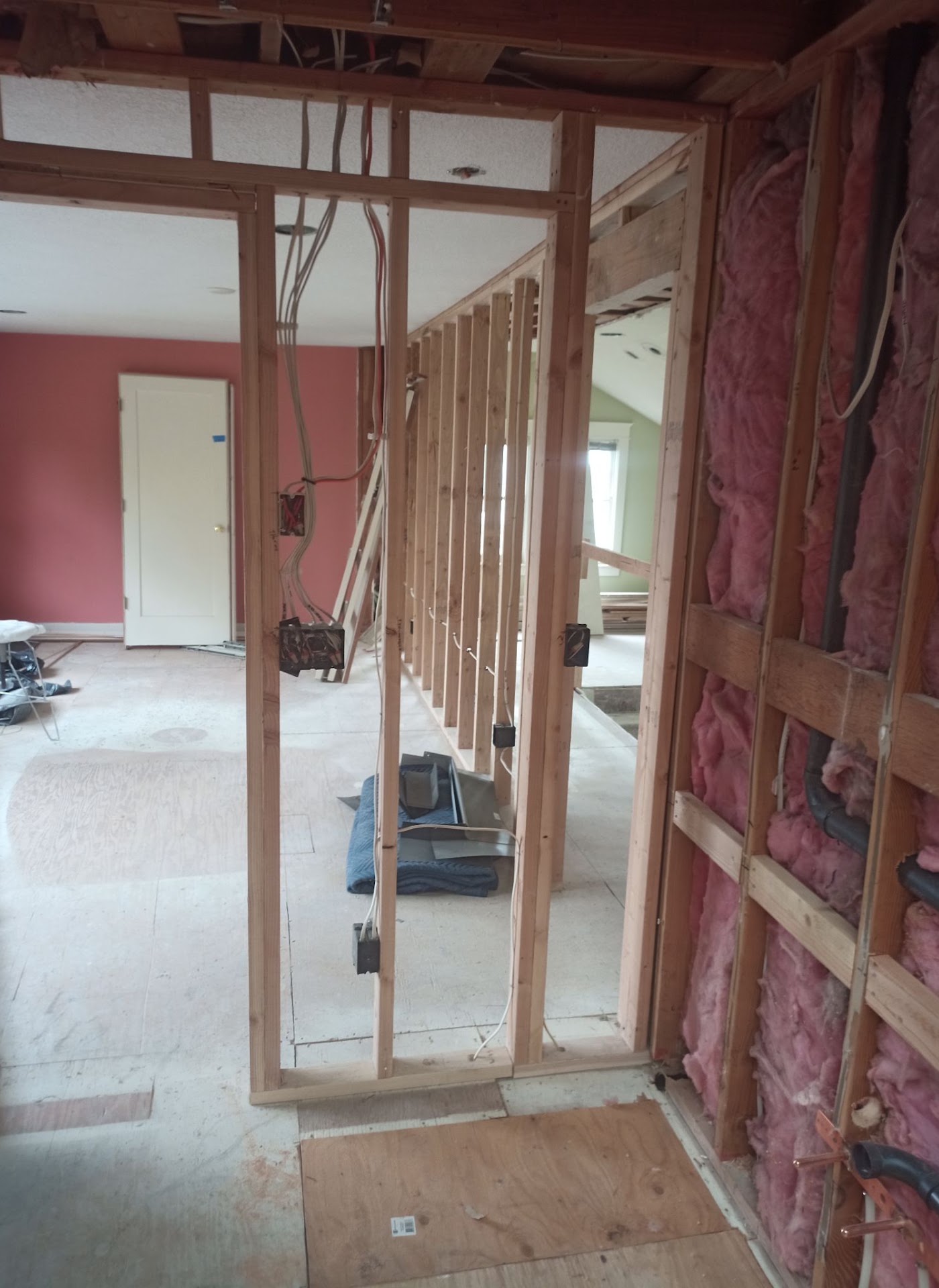 Home rewiring in progress with new outlet and switch boxes on open framing in Vancouver, WA