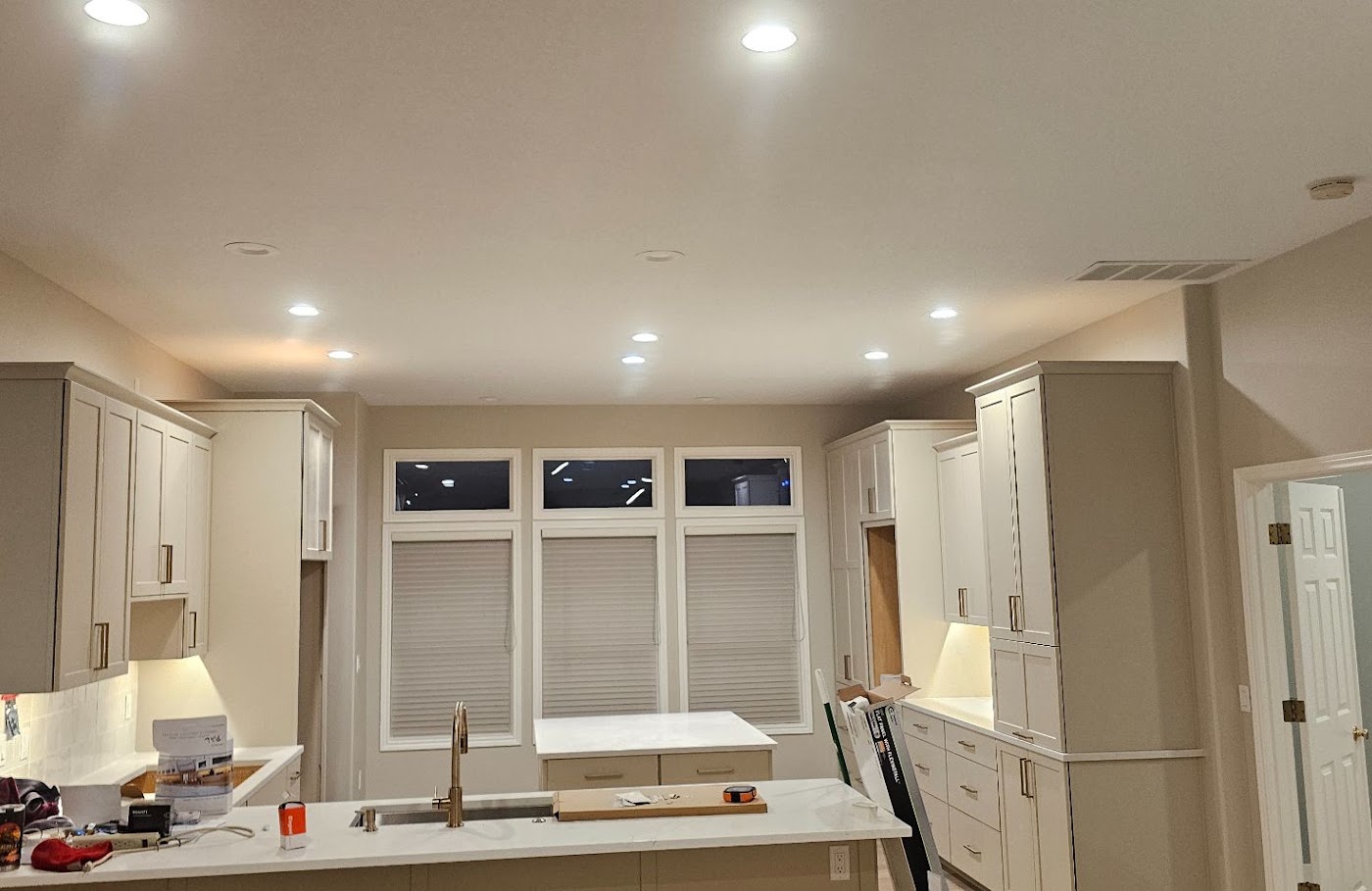 Recessed can lighting throughout a finished kitchen and dining area in Vancouver, WA