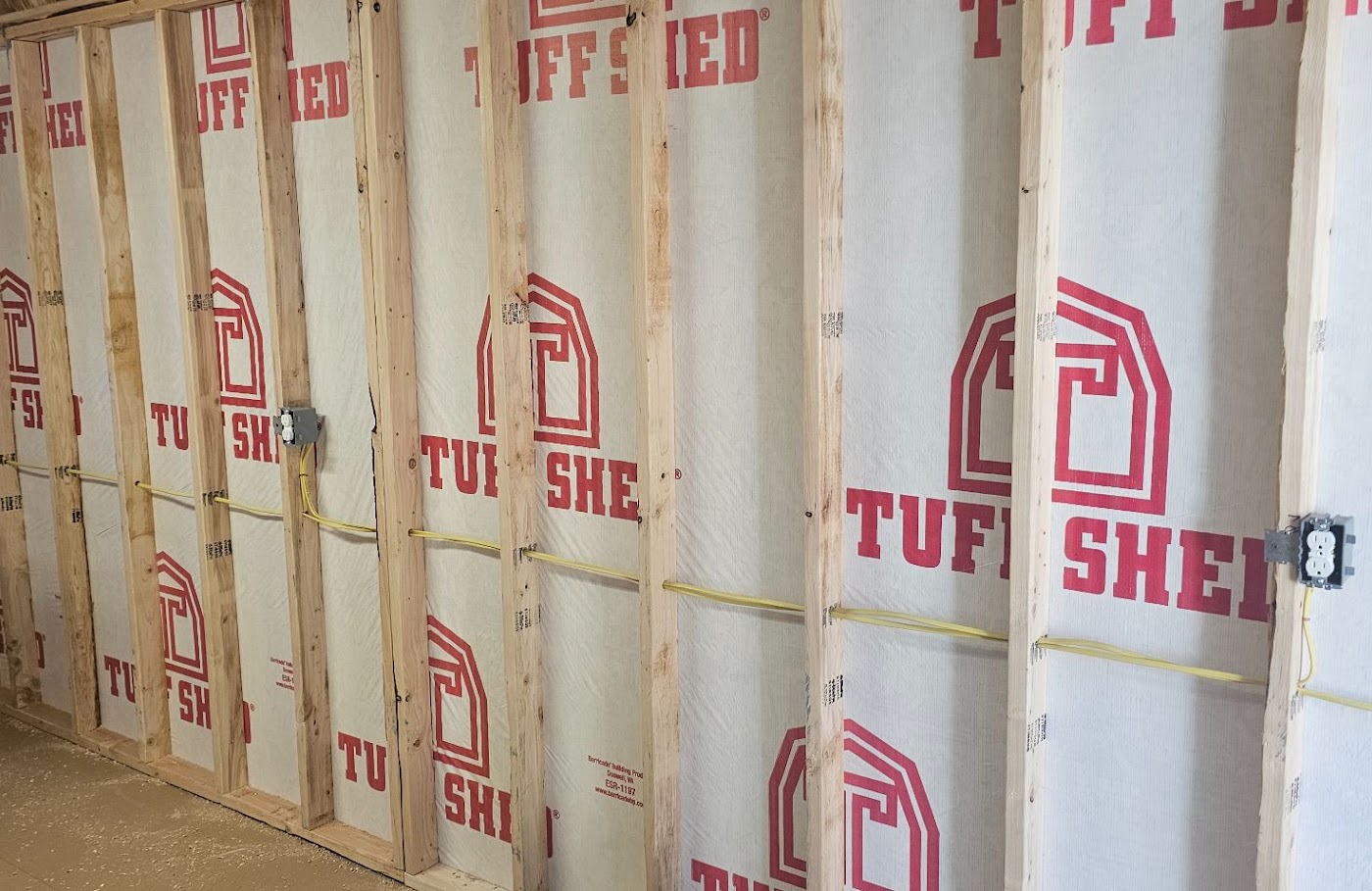 Receptacles and switch wiring roughed into a new backyard shed in Vancouver, WA