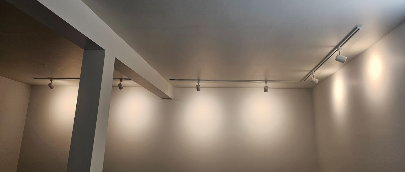 Track lighting installed and aimed in a finished Vancouver, WA basement room