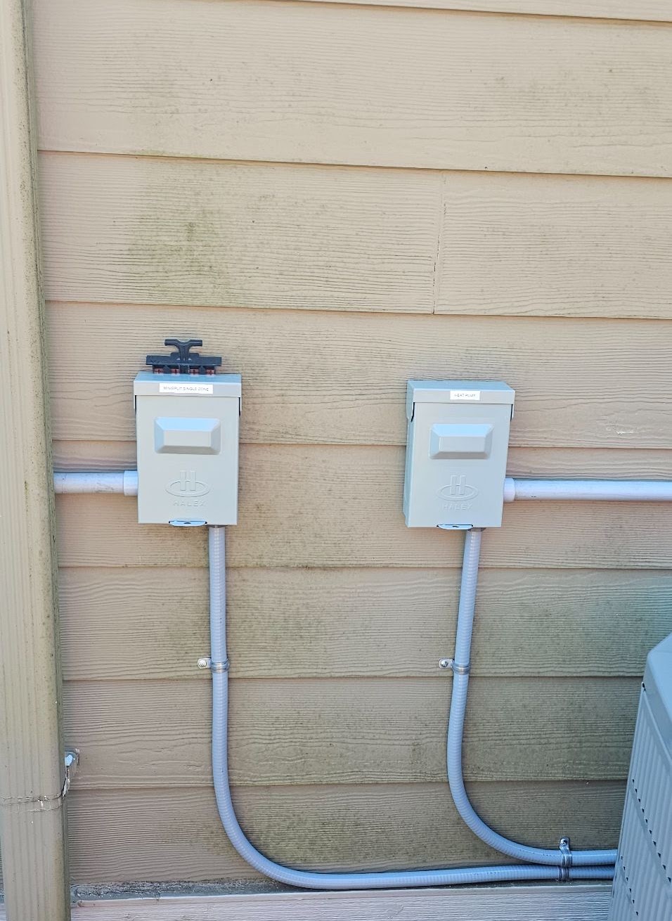 Outdoor disconnects wired for a ductless mini-split and heat pump in Vancouver, WA