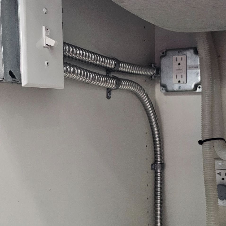 Switched garbage disposal circuit and GFCI receptacle wired under a Vancouver, WA kitchen sink